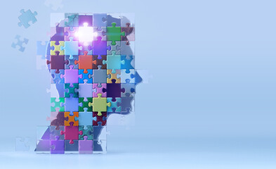A silhouette of a human head composed of colorful puzzle pieces. Complexity of the mind. Mental health, disorders, intelligence, creativity, cognitive process, problem solving, personal growth. 3D