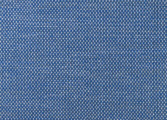Closeup of light blue textile. Fabric details backdrop