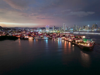 Panam&aacute; City, Panam&aacute; aerial view of the Casco Viejo historical French Square during dusk with city lights.