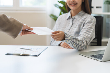 Good job, asian manager business giving financial reward in an envelope, business letter extra salary to company employee, woman worker office hand received premium bonus, getting cheque from her boss