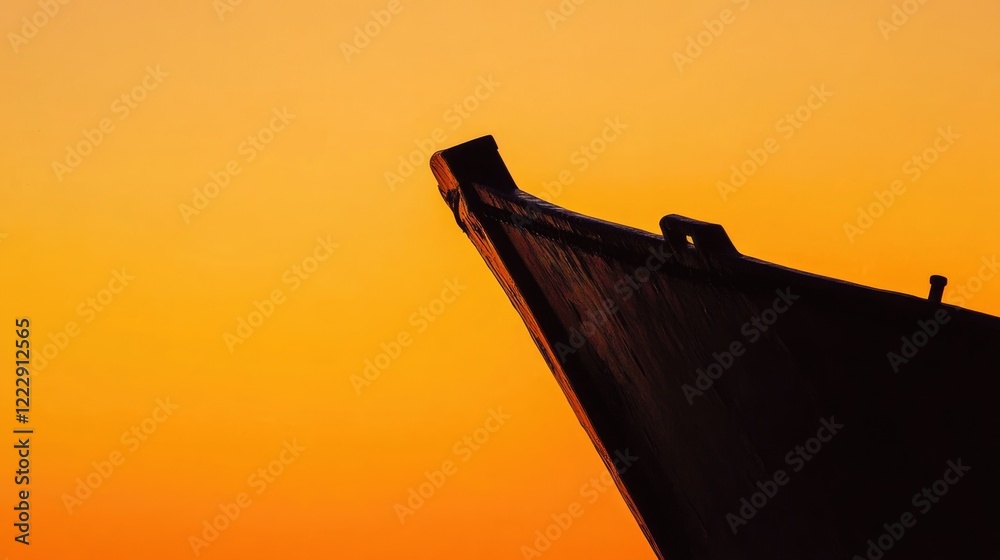 Poster sailboat bow silhouette against vibrant sunset sky with empty space for text and messaging