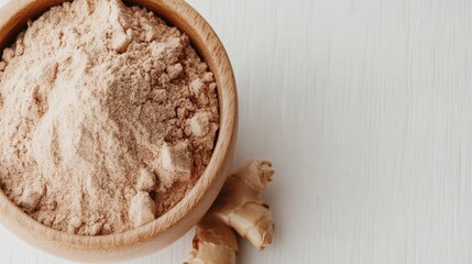 Rustic ginger powder displayed elegantly in a wooden bowl, emphasizing the intimate connection between food and culture, while reflecting warmth and comfort in cooking.