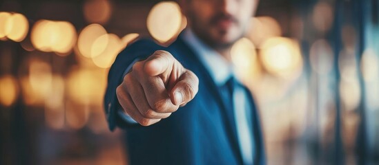 Confident businessman pointing gesture symbolizing leadership in modern office environment with copy space for branding or text insertion
