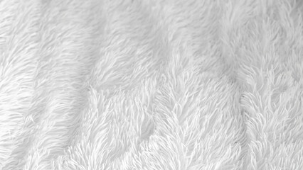 Elegant unmade bed with white bedding, creating a peaceful and inviting space.