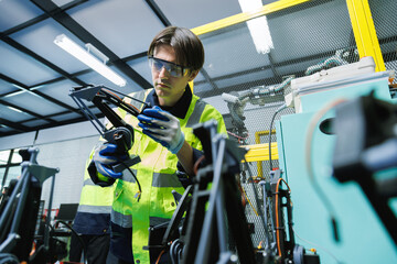 automation machine engineer students study and inspection control robot arm machine in robotics...