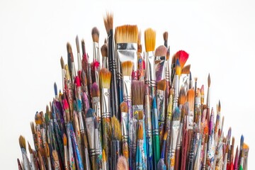 Obraz premium A Colorful Collection of Used Paint Brushes - A Vibrant Array of Artistic Tools