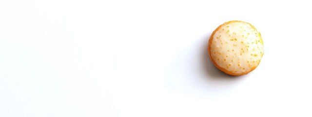 Round doughnut close-up on a white background with ample space for text highlighting desserts and sweet treats for advertisements.
