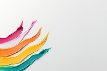 Colorful paint strokes create vibrant wave across minimalistic b