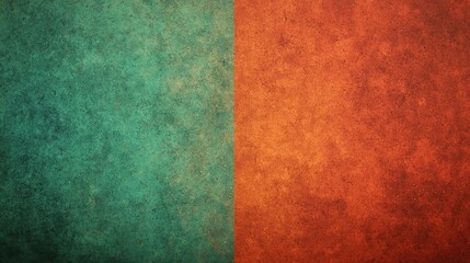Fototapeta premium A textured split composition featuring green on the left and orange on the right, creating a striking contrast.