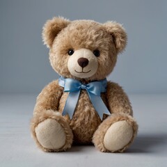 Fototapeta premium The teddy bear has large round eyes, a stitched smile, and a small red bowtie around its neck. Its paws are detailed with lighter-colored pads 