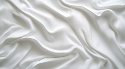 Fototapeta premium Elegant white satin fabric texture for photography soft light background ideal for showcasing products and enhancing visual aesthetics.