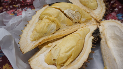 Ripe durian fruit with a bright yellow color looks delicious and tempting