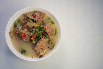 Boiled pork ribs with lime, chili, and coriander, a food that Thai people love to eat.