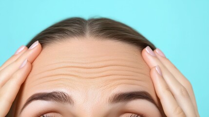 Fototapeta premium Front-facing close-up showing forehead wrinkles subtly illuminated