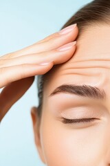 Fototapeta premium Macro focus on forehead lines and subtle skin texture