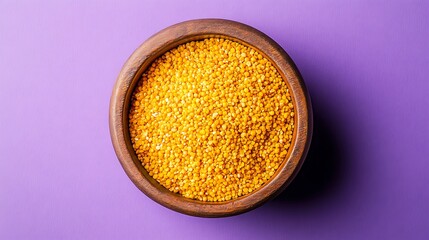 One pot preparation with kodo millet mung bean lentils commonly known as kodo millet khichdi in shot on purple background