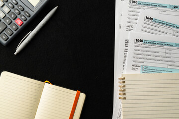 Organizing the 1040 individual income tax form and calculator for efficient tax filing preparations