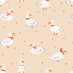 Seamless pattern with cute ducks with red accessories, scarf, bows on dots background