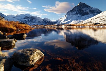 Tranquil Mountain Lake at Dusk, pristine waters reflecting snow-capped peaks, warm golden hues enveloping the serene landscape.