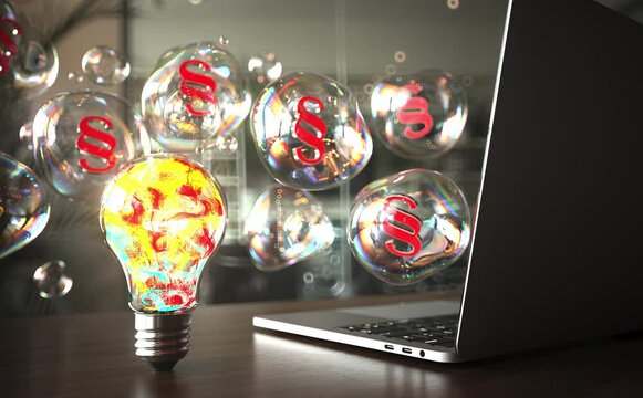4k endless loop 3D animation. Colorful glowing light bulb with iridescent bubbles featuring legal symbols near a laptop on a wooden desk. ProRes 4444.