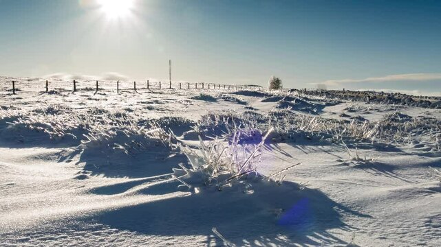A Timelapse of a frozen landscape wilderness on a bright sunny day