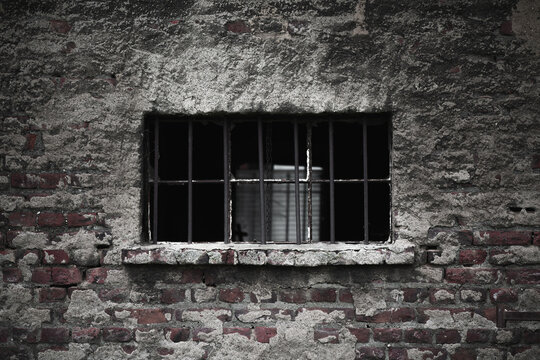 Open window in an old brick wall.