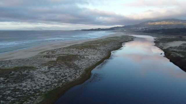Aerial View of San Pedro Lagoon in Galicia - Drone captures sea water inflow at San Pedro Lagoon, Galicia's coastal wetland habitat.