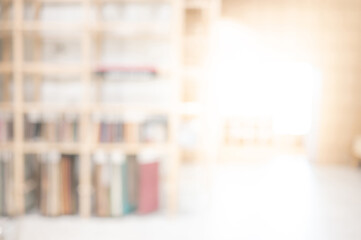 Abstract blurred public library interior. Blurry room perspective with decorative shelves. Empty space for background, backdrop or advertising in business or education concepts