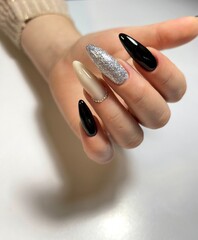 Beautiful stiletto nail design on a woman's hand