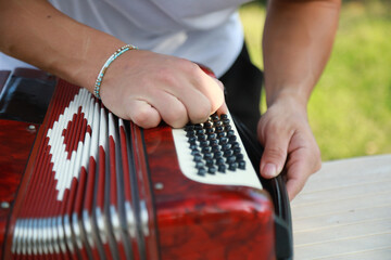 Player Preparing To Play Accordion