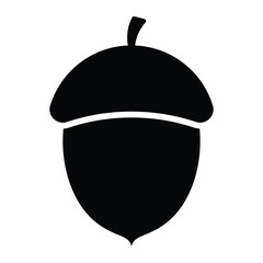 Acorn vector icon. Oak nut illustration. Natural seed and forest element. Black silhouette isolated on white background.