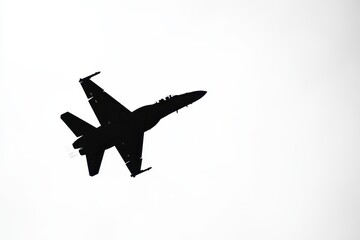 Fighter Jet Silhouette Against Minimalist White Sky Background