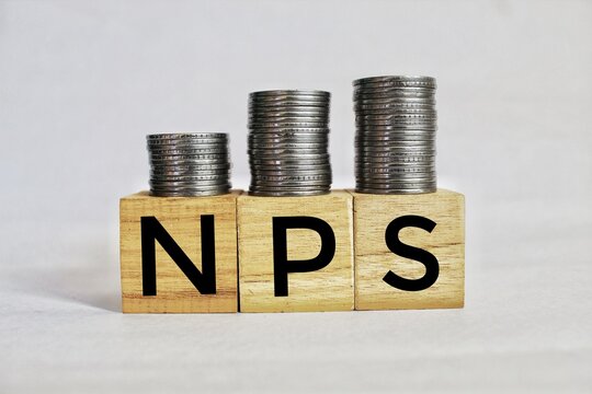 NPS or national pension scheme with wooden bids or blocks.