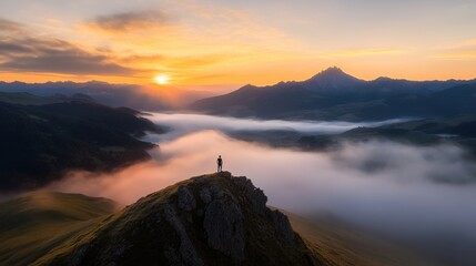 Explore breathtaking mountain vistas at sunrise, capturing the tranquil beauty of foggy valleys and majestic peaks. Perfect for adventurers.