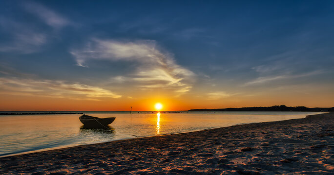 Fishing boat after a day's work in the bay with a wonderful sun