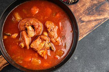 Tomato meat soup vegetable goulash fresh tasty food dish delicious gourmet food background on the table rustic food top view copy space keto and paleo diet