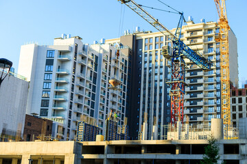 A construction site with a crane lifting a large object