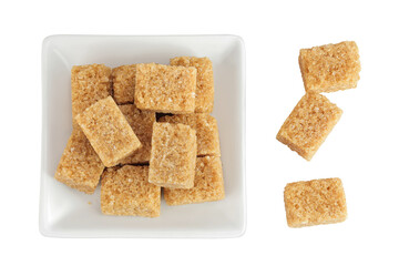brown sugar in a ceramic bowl isolated on white background. Top view. Flat lay