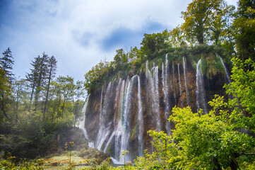 Scenic view of majestic waterfall Veliki Prstavac in magical Plitvice lakes National Park, Karlovac, Croatia, Europe.