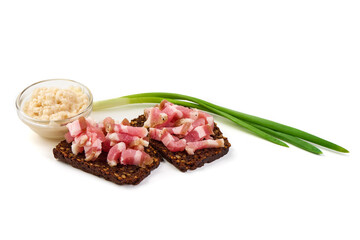 Slices of Bacon on Rye Bread isolated on white background.