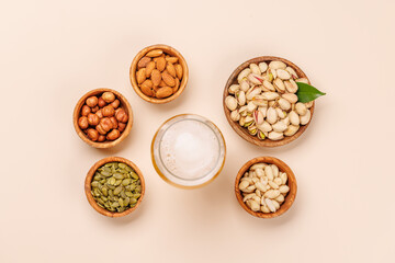 A vibrant assortment of various nuts and beer