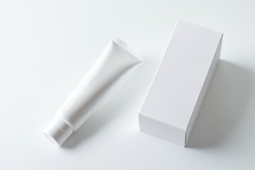 toothpaste mockup concept. A minimalist composition featuring a white tube and box on a neutral background, ideal for skincare or cosmetic branding.