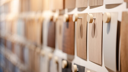 Wooden laminate samples collection in material library. Furniture finishing decoration and interior...