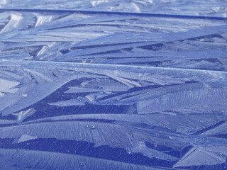 Angular and intricate Ice crystal patterns on car bonnet