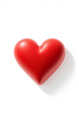 Fototapeta premium a close up of a red heart on a white surface