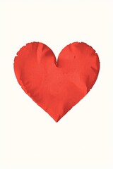 there is a red heart shaped pillow on a white background