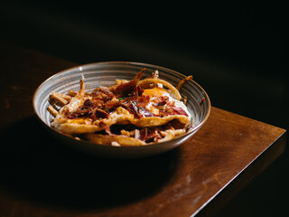 Fries with egg and ham