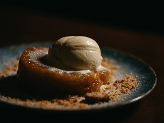 Cake with ice cream and a black background	