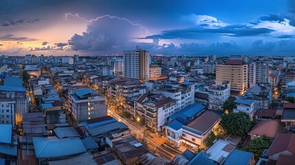 Naklejka premium Panoramic view of city skyline at twilight with dramatic lightning storm.