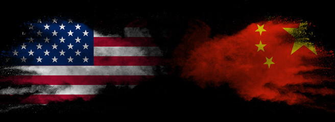 American and Chinese flags in smoke shape on black background. Concept of conflict war and customs...